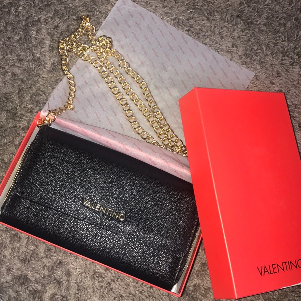 💯VALENTINO WOC